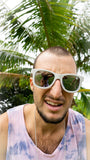mens sunglasses float on water surf